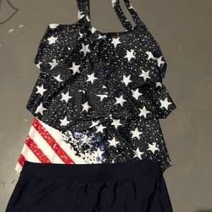 2 piece Swimsuit. Top is XL Boy swim shorts XL